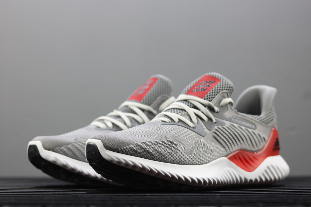 grey and red adidas