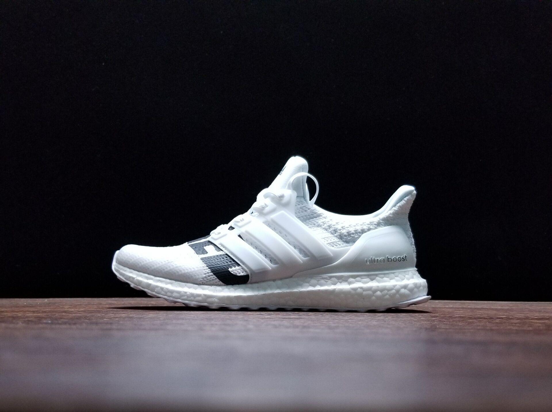 undefeated ultra boost white