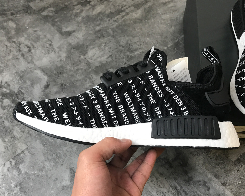 nmd the brand with 3 stripes black