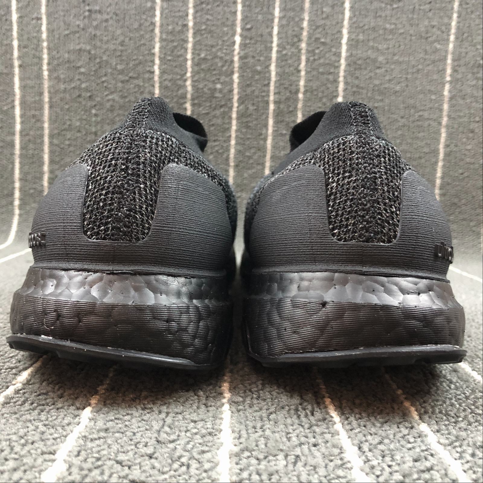 Ultra boost laceless mid triple black store