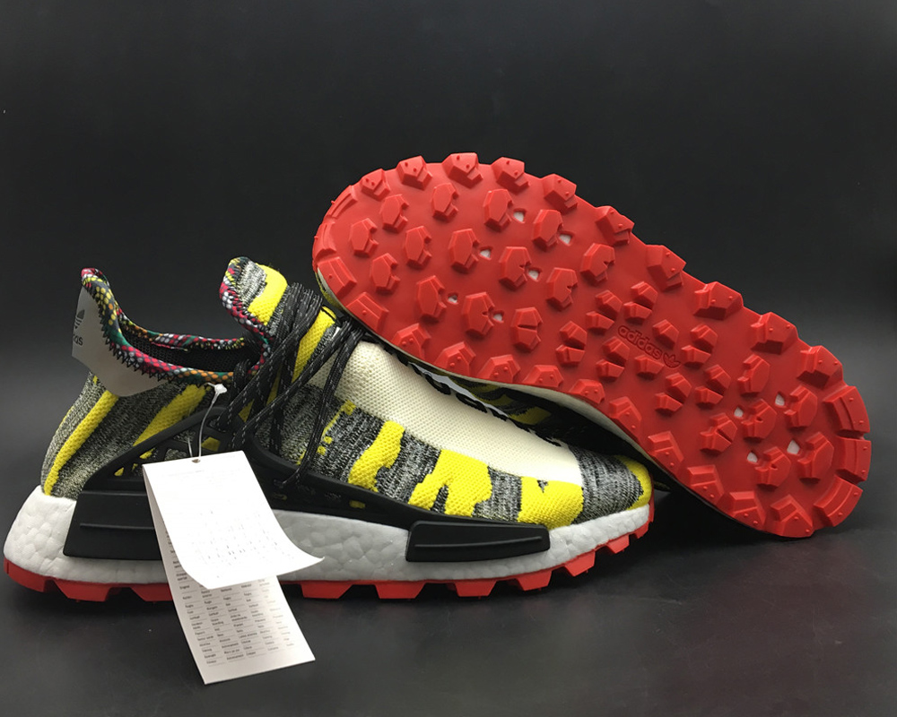 nmd hu pharrell solar pack red