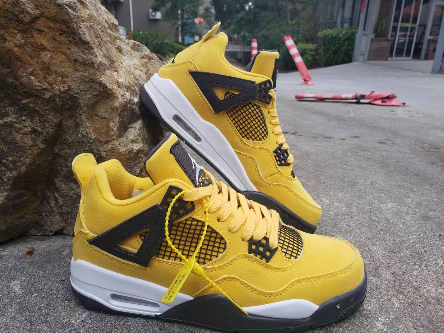 tour yellow jordan 4