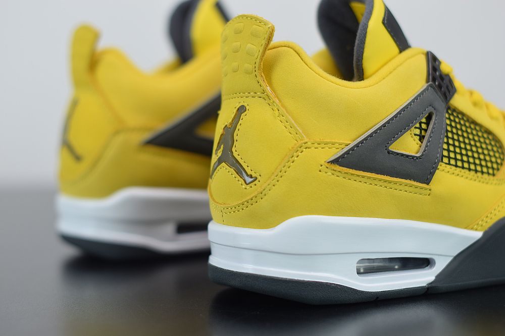 grey and yellow jordan 4