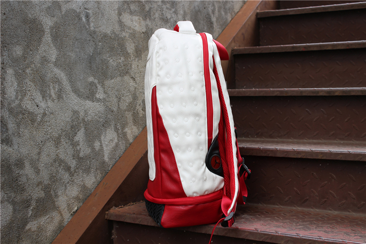 white and red jordan retro 13