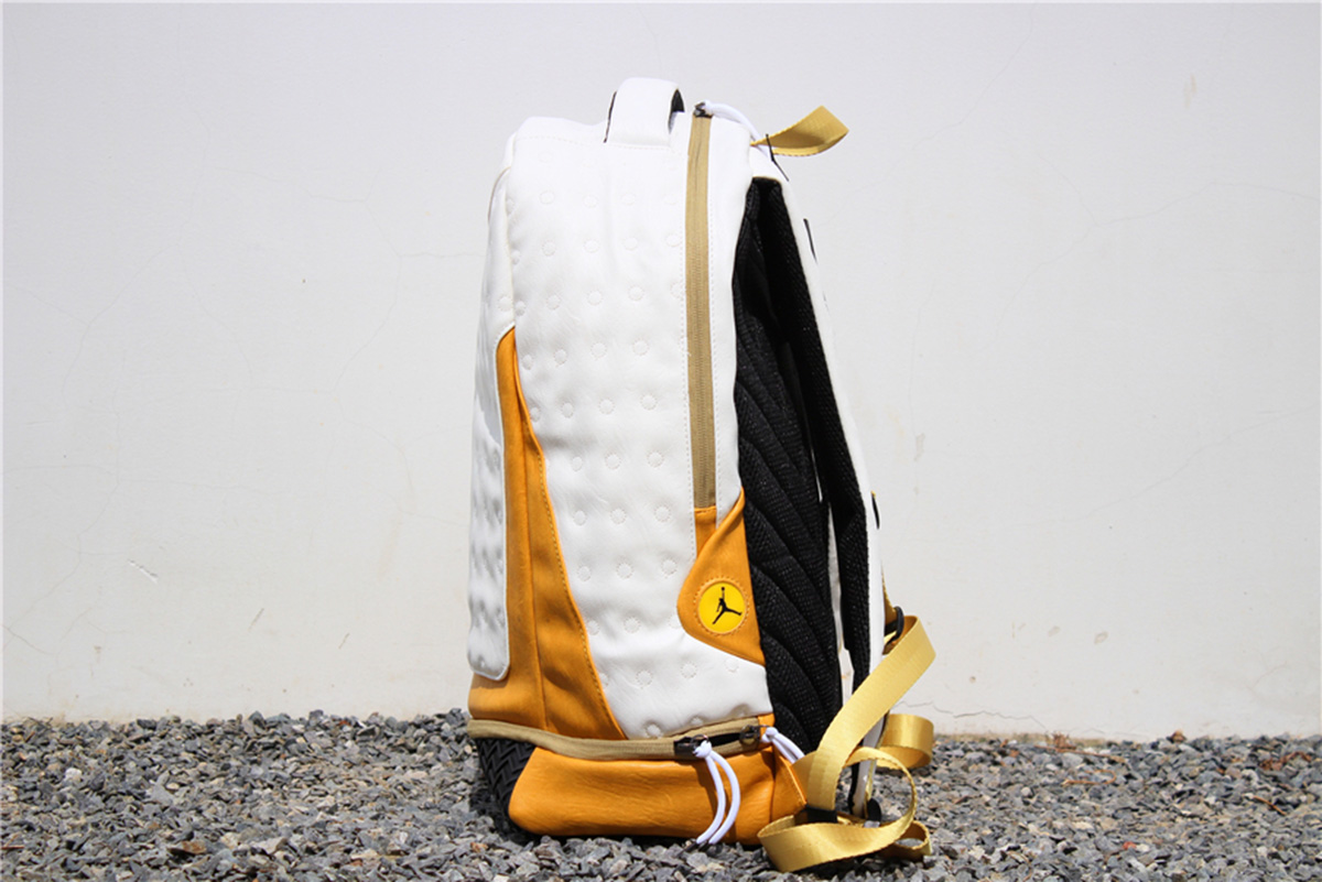 white and gold jordan backpack