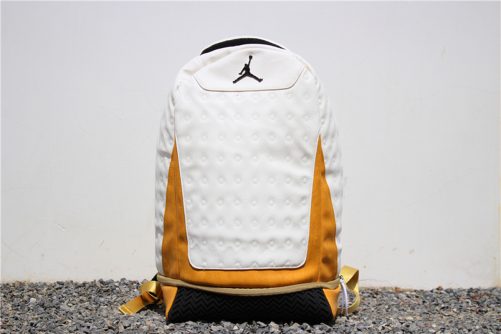 white and gold jordan backpack