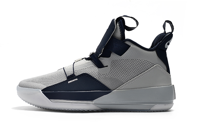 grey and navy blue jordans