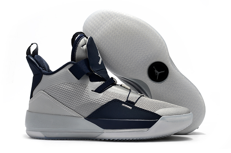 grey and navy blue jordans