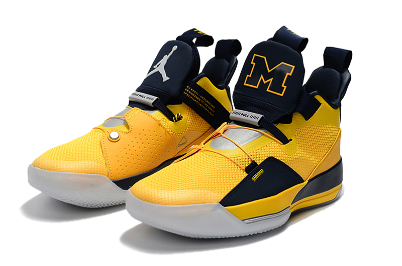 navy blue and yellow jordans