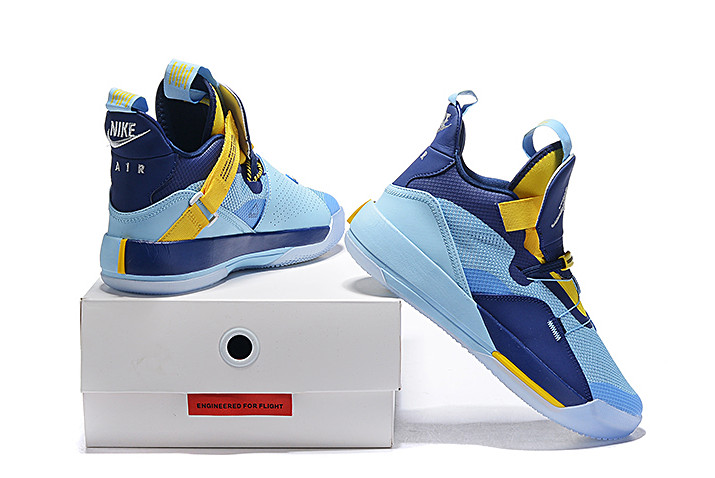 yellow and navy blue jordans