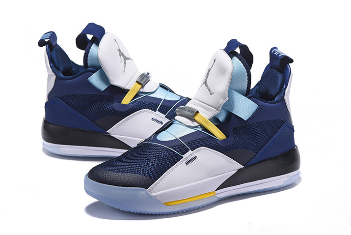 yellow and navy blue jordans