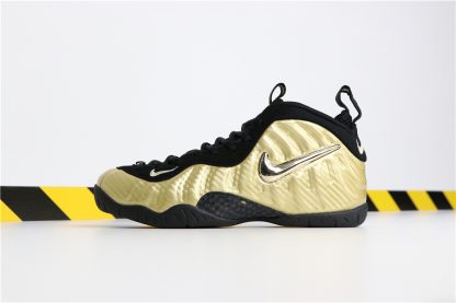 nike foamposite black gold