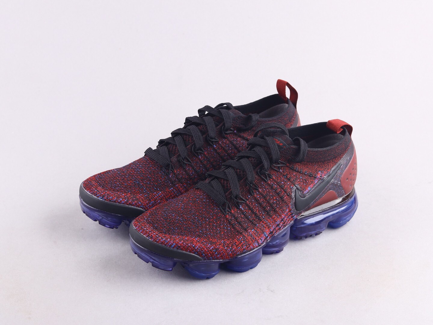 red and blue nike vapormax