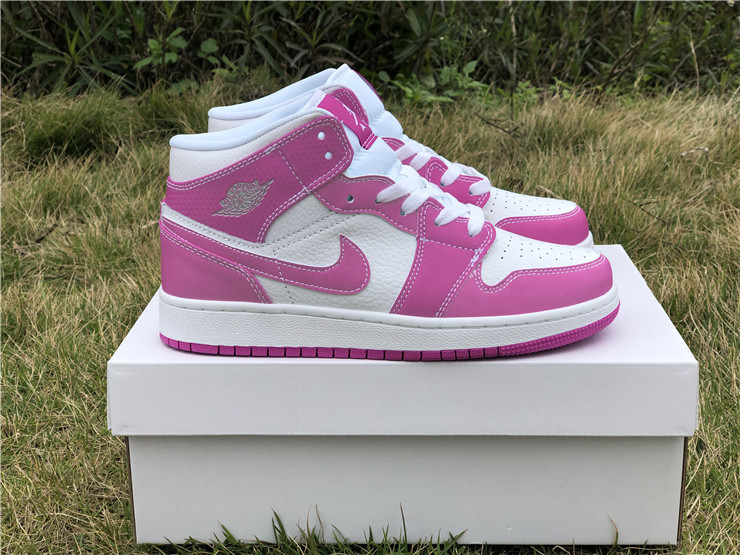 white and pink air jordans