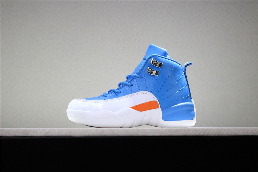 orange and white jordans 12