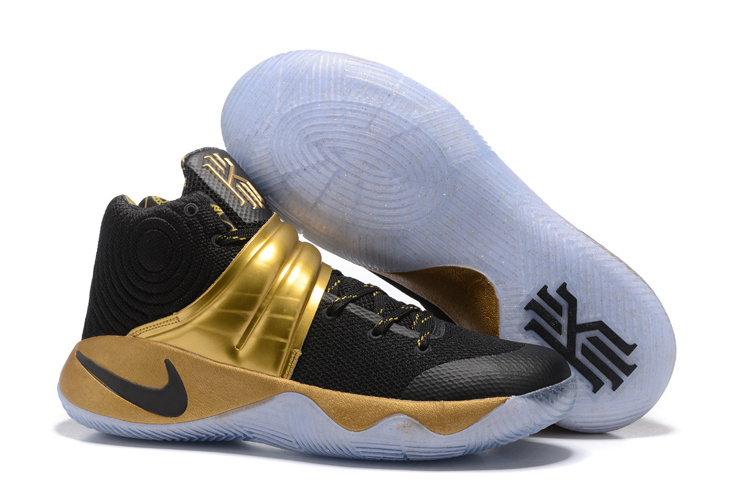 kyrie shoes black and gold