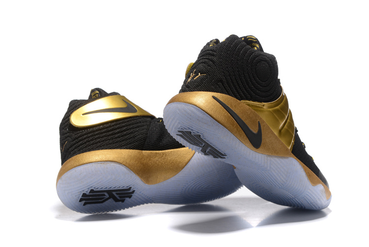 nike black and gold mens shoes