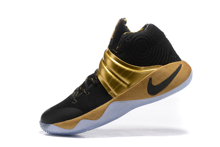 kyrie irving shoes black and gold