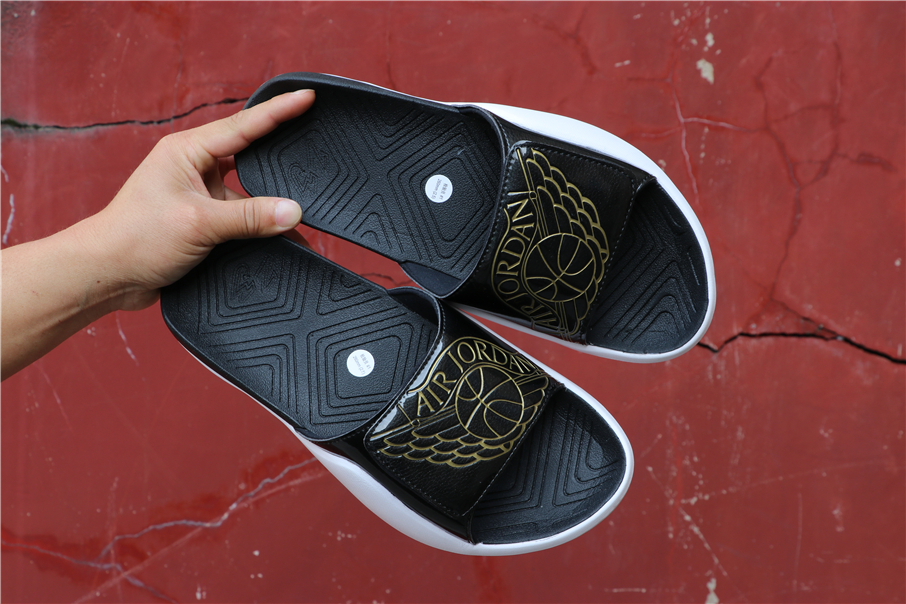 jordan hydro 6 slides black and gold