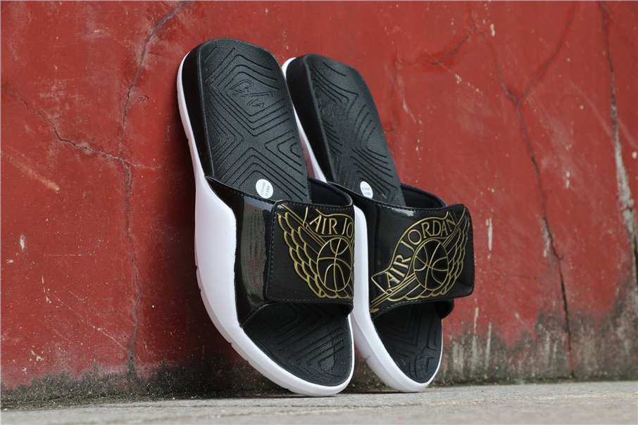 gold jordan slides