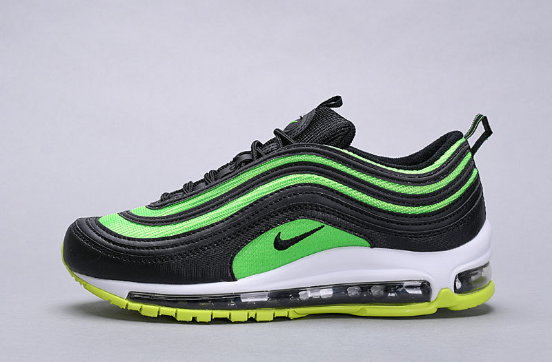 green and black nike sneakers