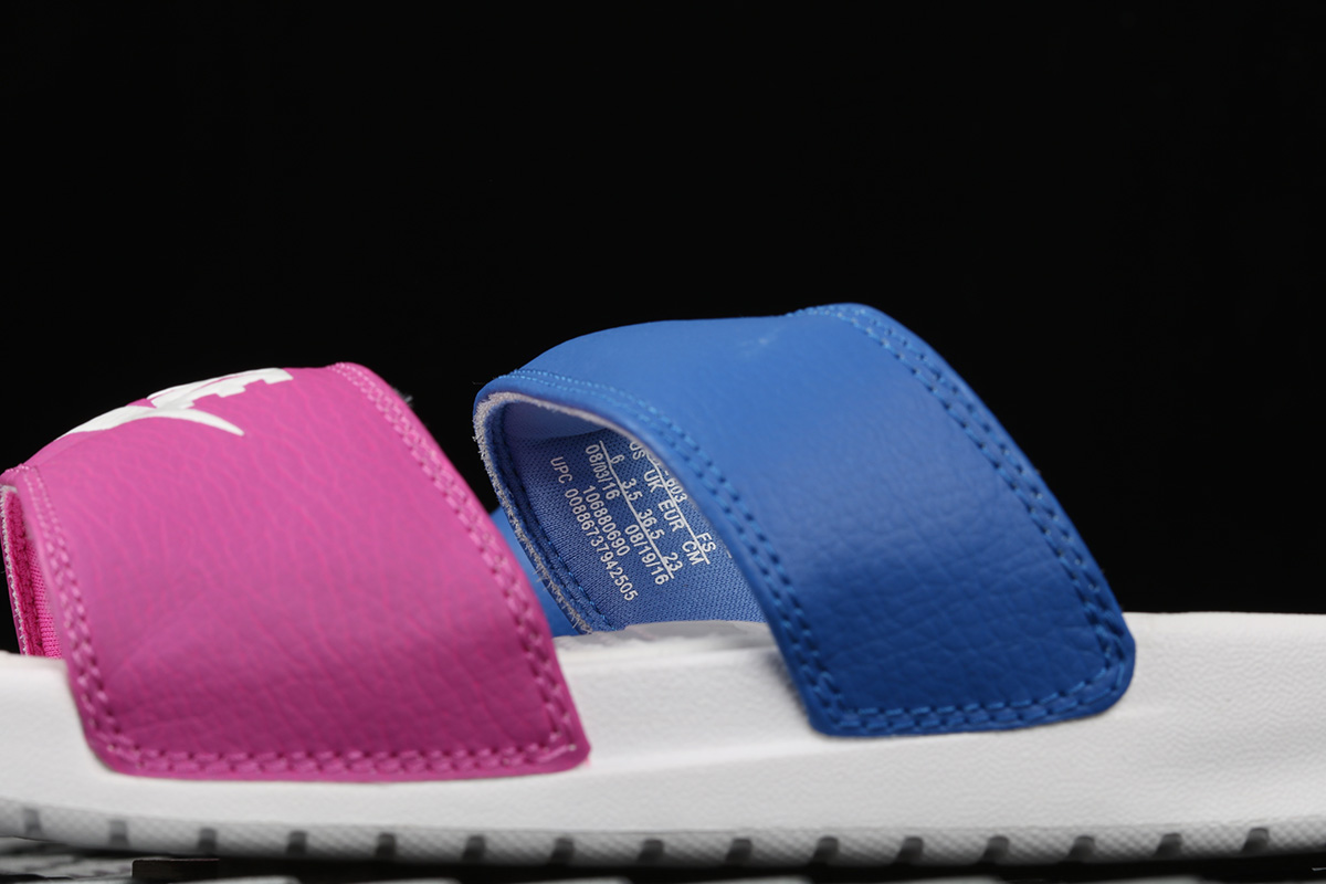 pink and blue nike slides