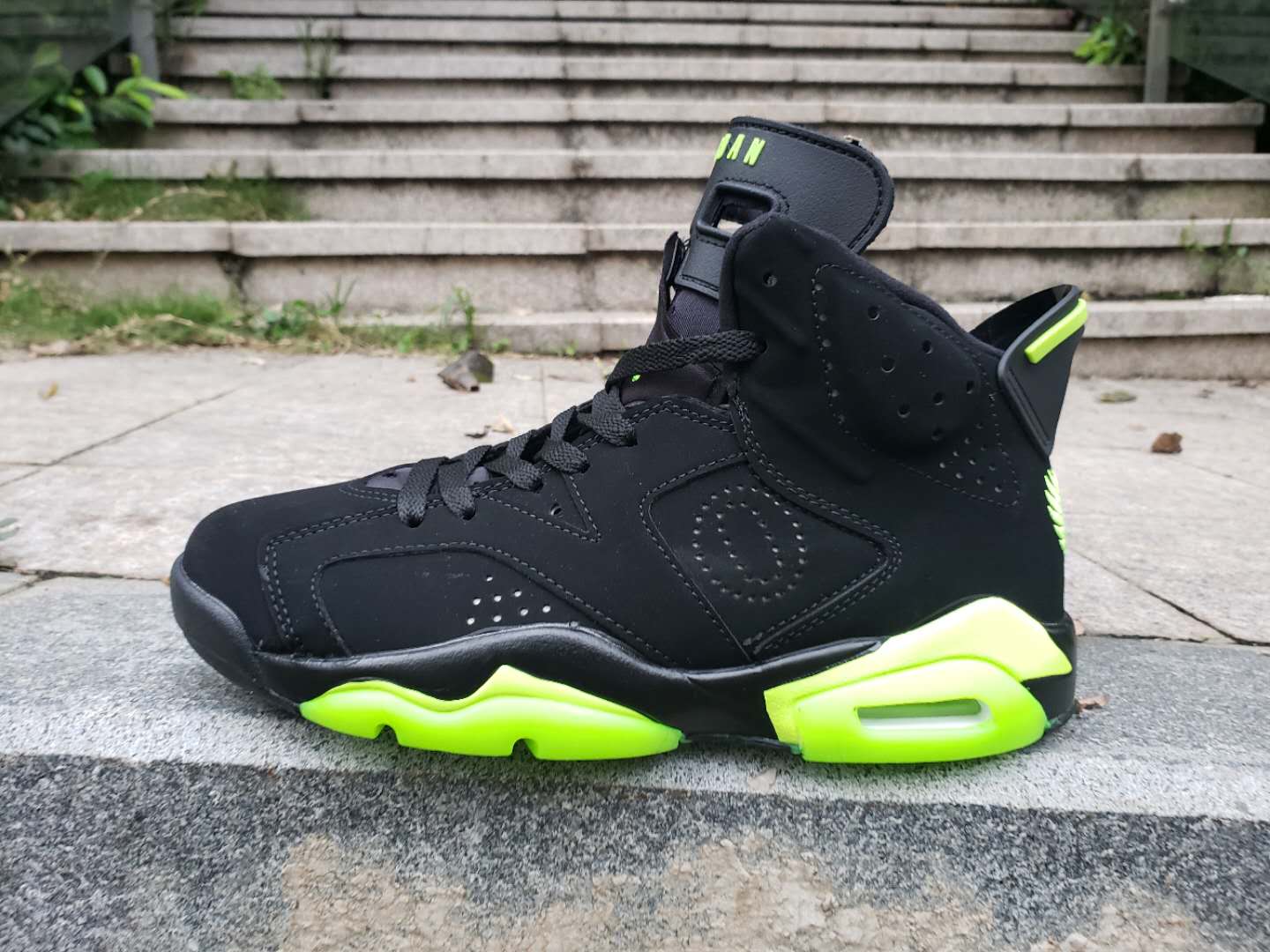 jordan black and green shoes