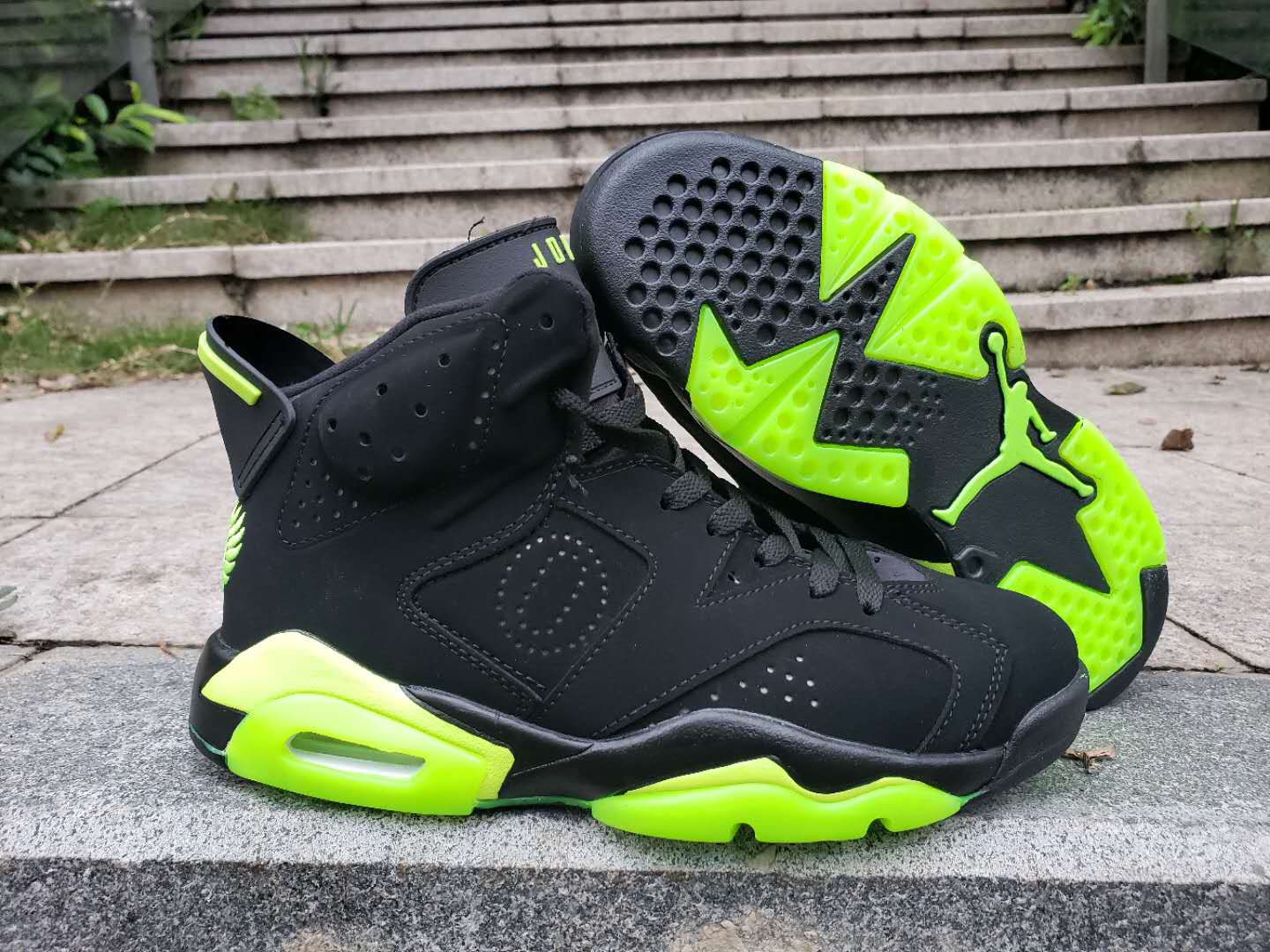 jordan black and green shoes