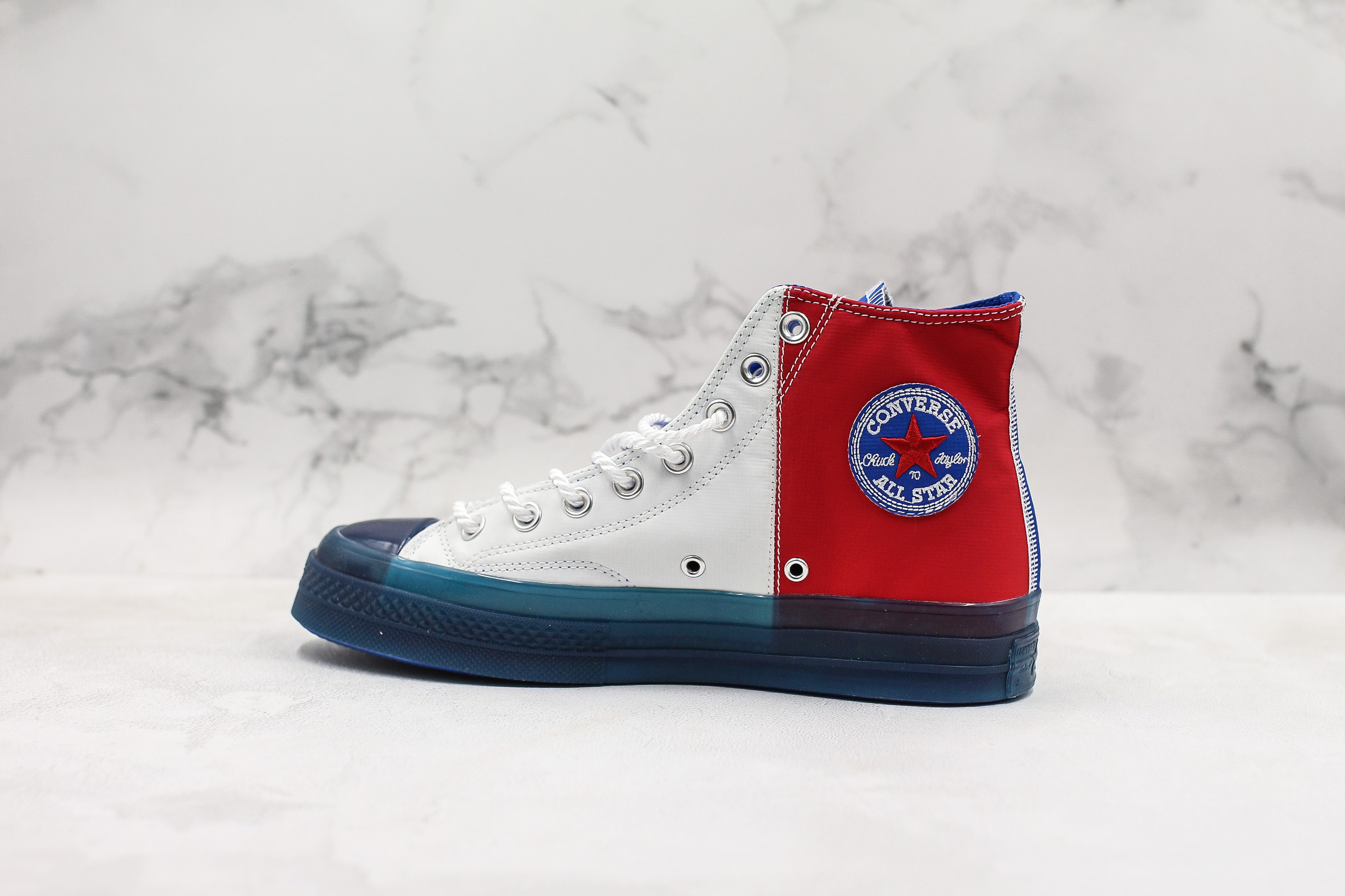 red white and blue converse tennis shoes
