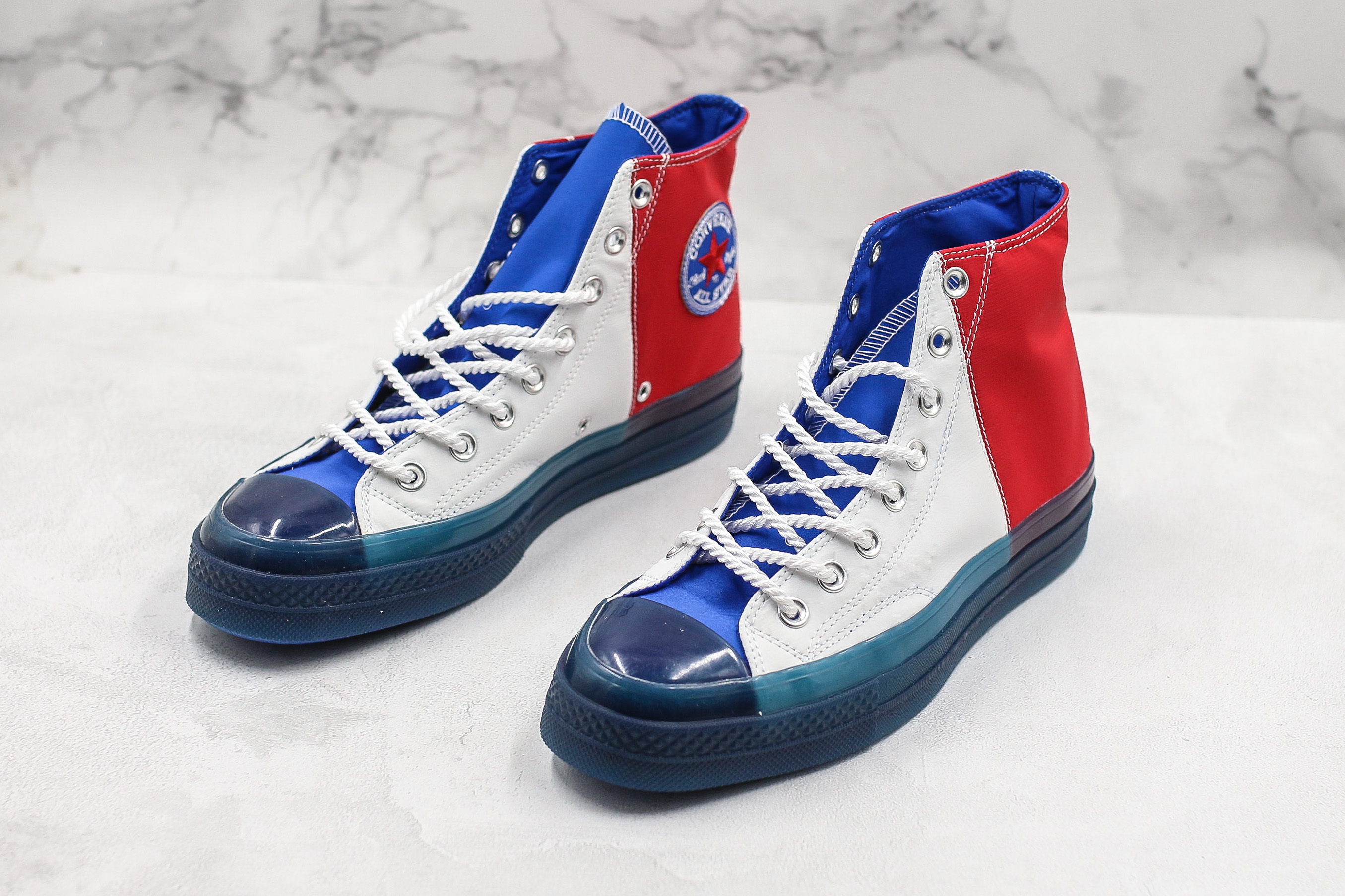 red white and blue converse tennis shoes