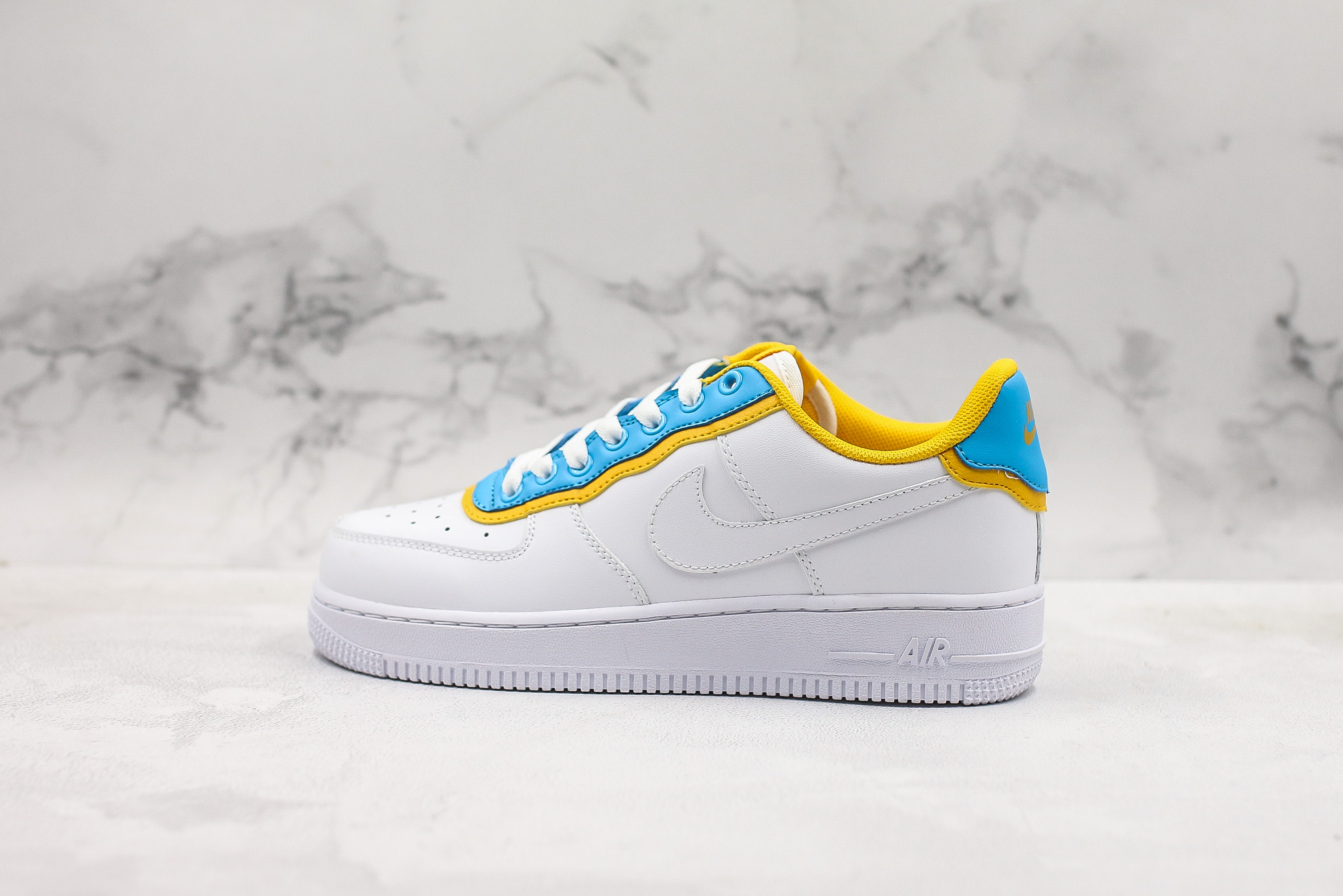 blue and yellow high top air force ones