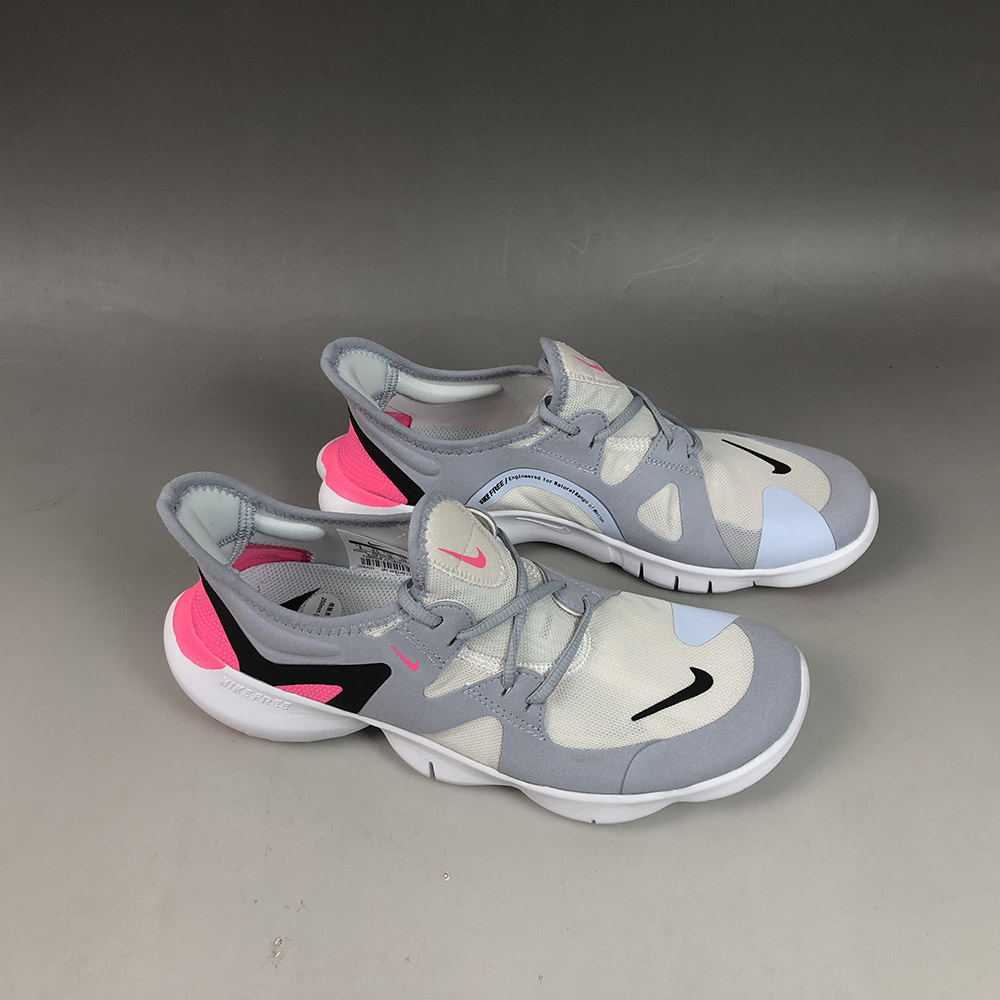 nike pink and gray running shoes