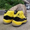 jordan 11 black yellow