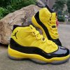 black and yellow jordans 11