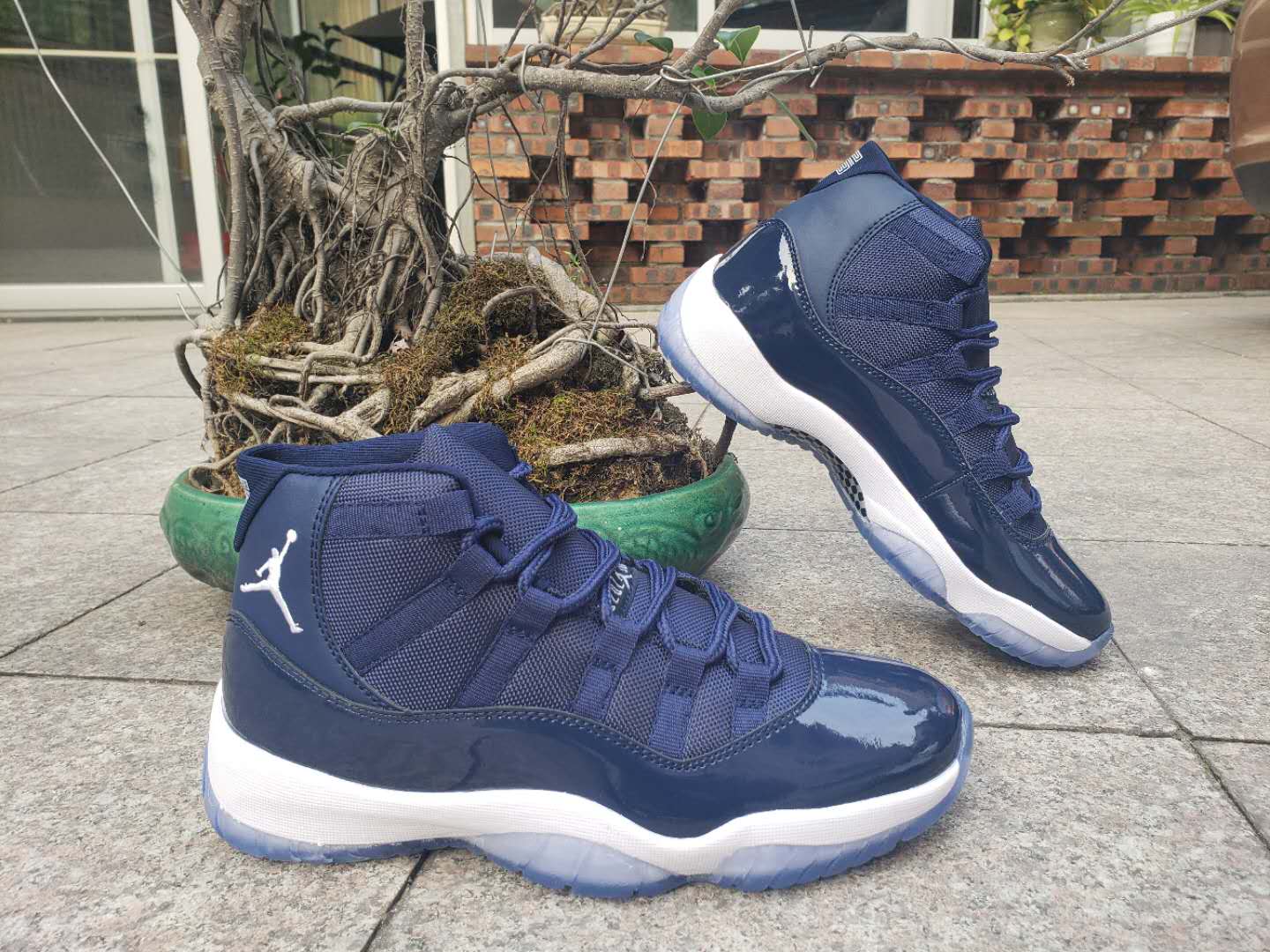 navy and white jordan 11