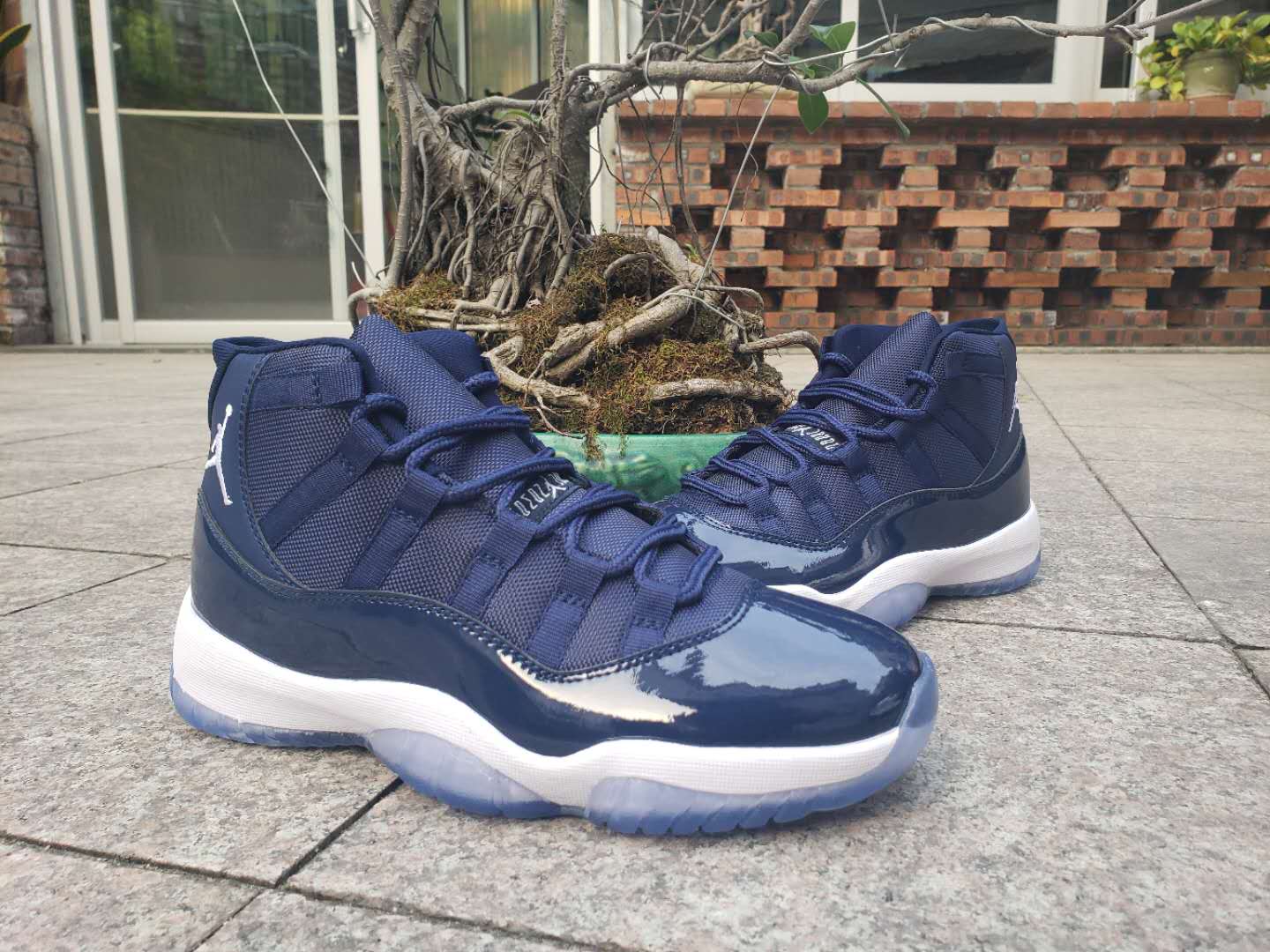 navy blue and white 11 jordans