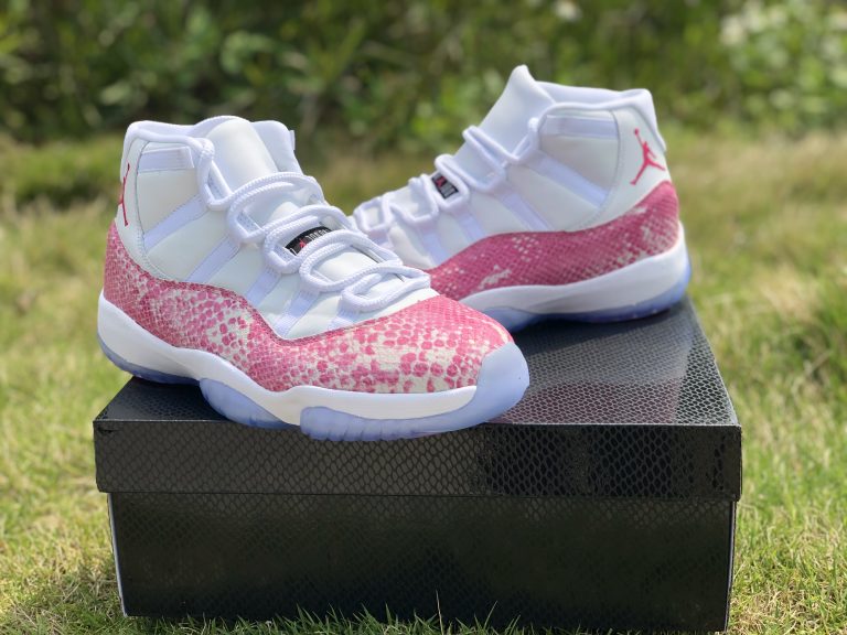 white and pink snakeskin 11s