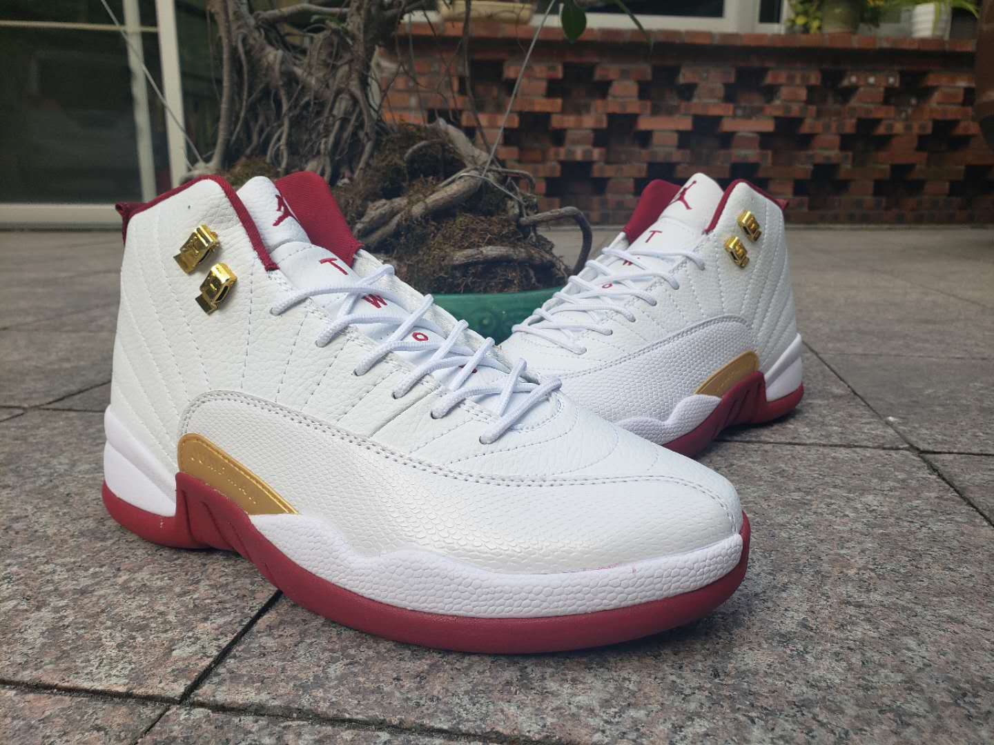 white and red and gold jordans