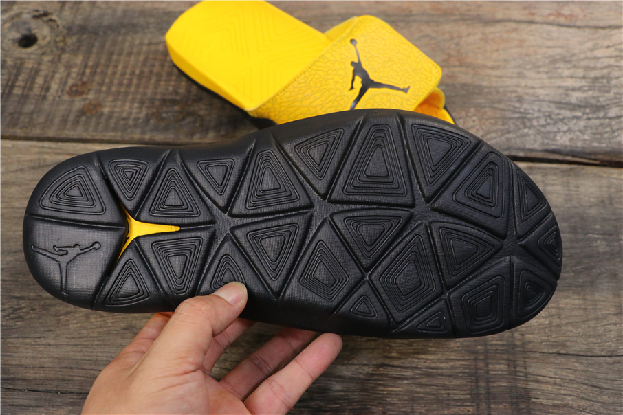 black and yellow jordan slides