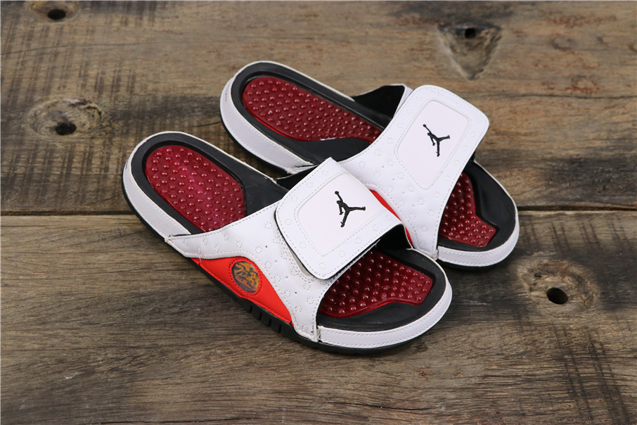 red and black jordan sandals