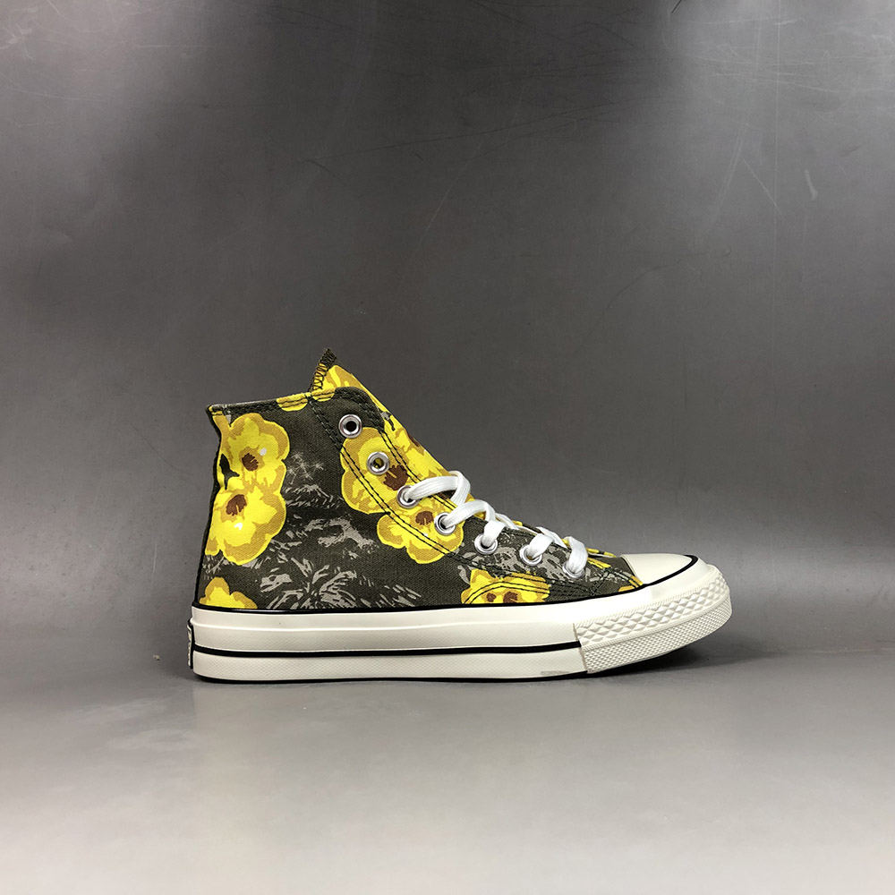 yellow converse with flowers