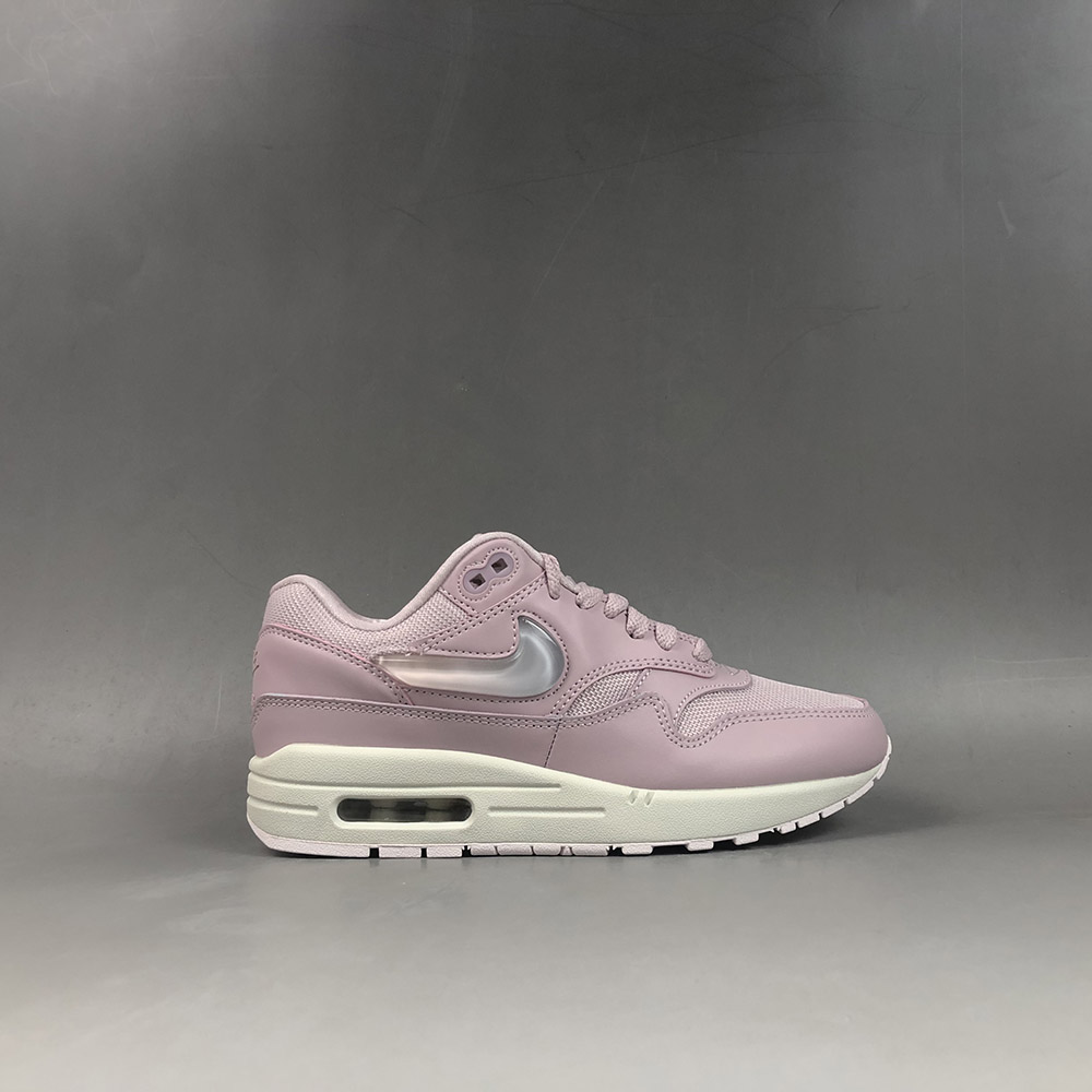 grey nike shoes with pink swoosh