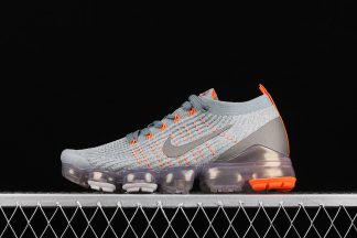 grey orange and blue vapormax