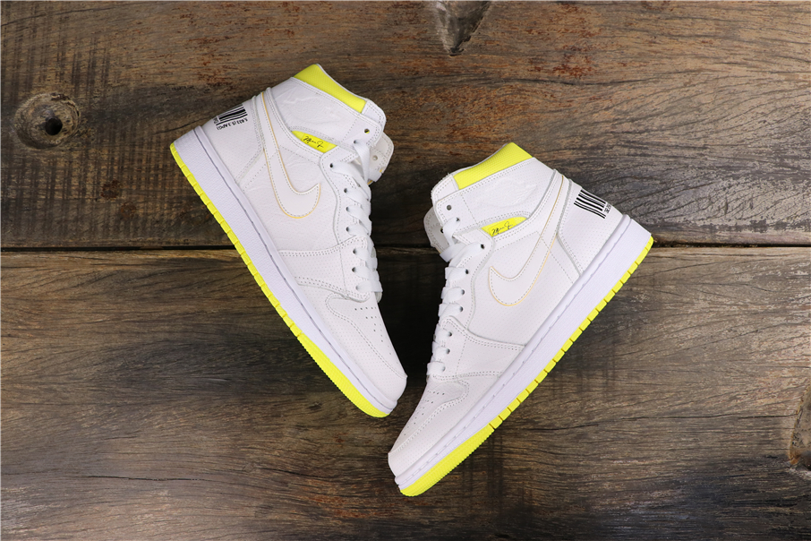 yellow and black jordan 1 womens