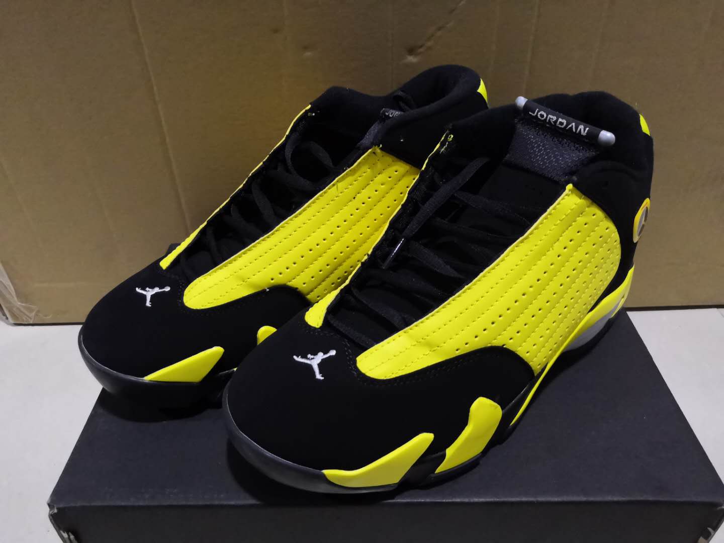 jordan 14s yellow and black