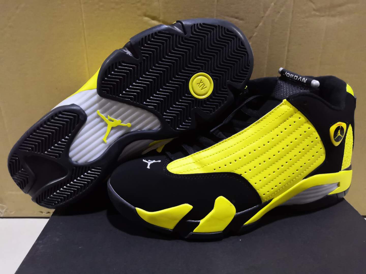 black and yellow jordan 14 release date