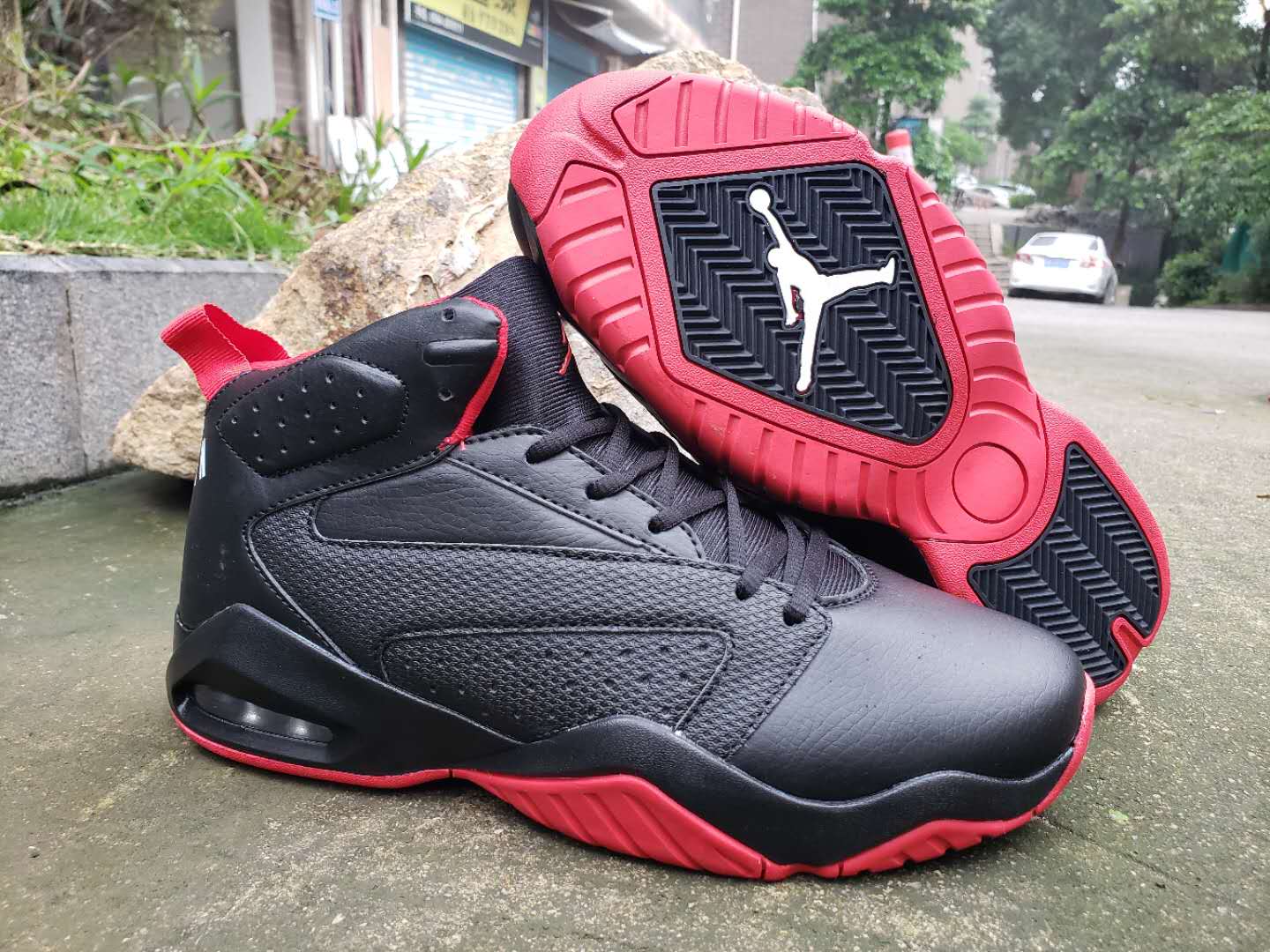 red and black jordan lift off