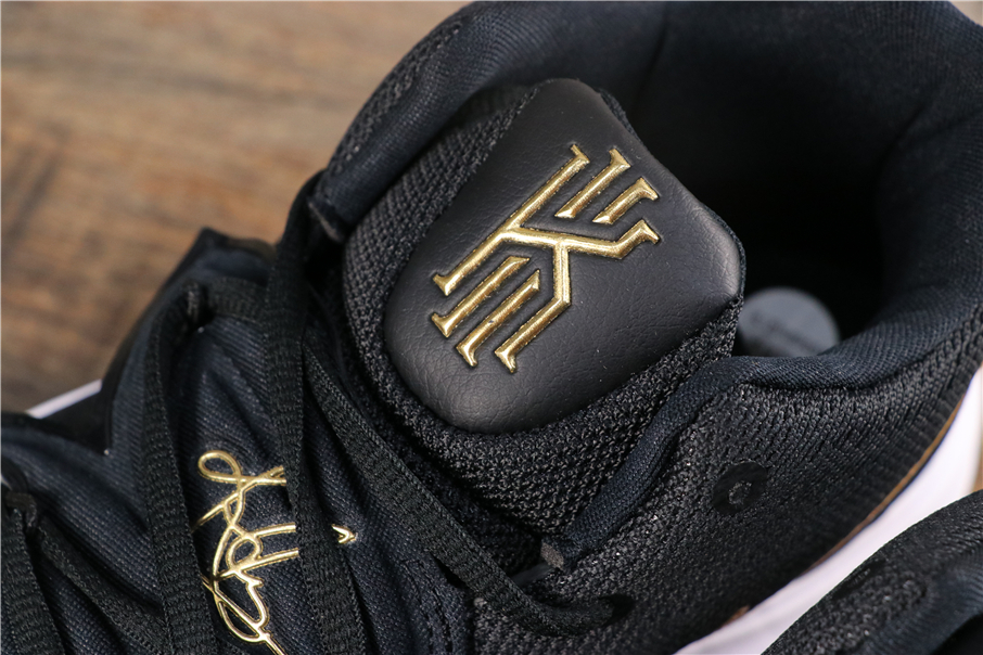 black and gold kyrie 5