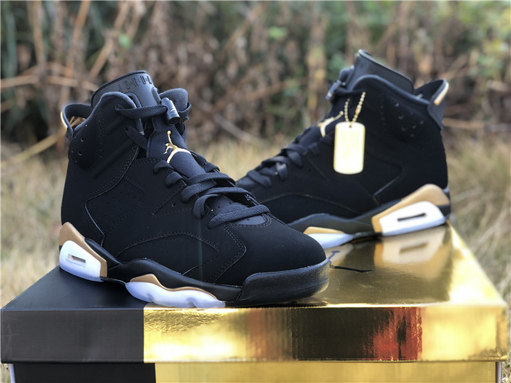 black and gold jordans 6