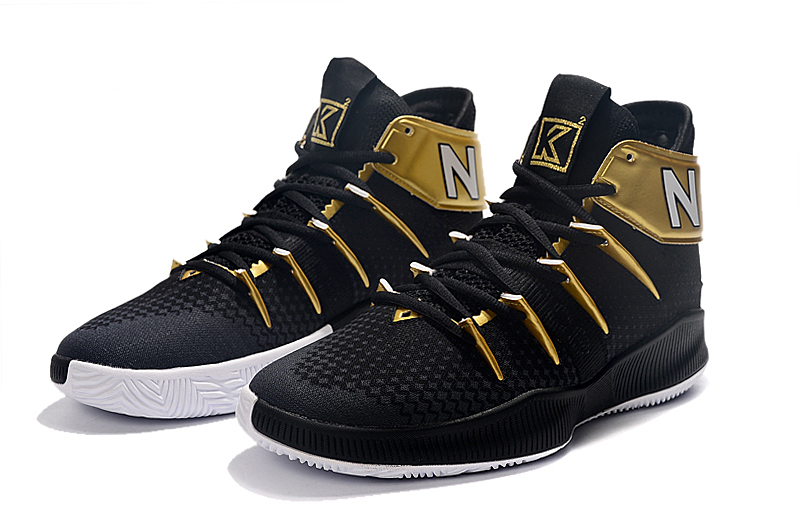 new balance black and gold shoes
